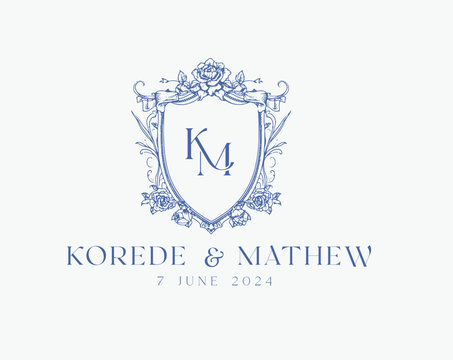Wedding logo crests vector design royal style blue color illustration monogram crest design with KM initial surrounded by baroque style intricate motifs