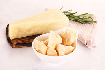 Chopped Italian hard parmesan cheese