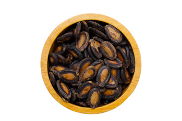 Roasted watermelon seeds on white background.