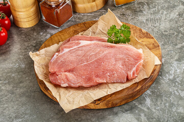 Raw pork schnitzel for cooking