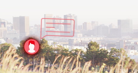 Image of social media icon and speech bubble over cityscape