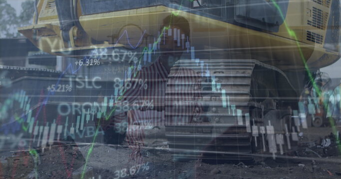 Image of financial data processing and statistics over diverse men working in factory - Powered by Adobe