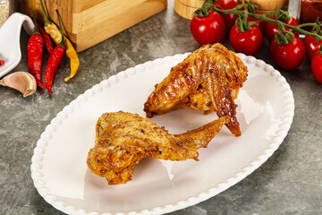 Tasty roasted chicken wing with spices