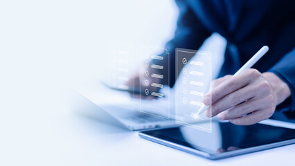 businessman's signature in the form of agreement smart contract agreement bank on a laptop. concept...