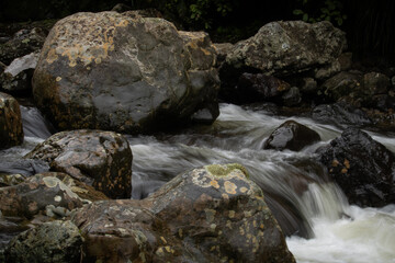 Close-Up of Rocks and Flowing Water with Motion Blur
