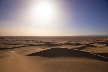 A dusk of panoramic sand dune at Mhamid el Ghizlane in Morocco wide shot