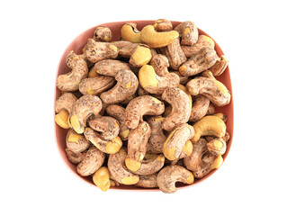 A plate of nutritious breakfast nuts cashews on a white background