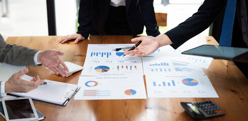 Business people talk project strategy at office meeting room. Businessman discuss project planning with colleague at modern workplace