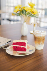 Red Velvet Cake and Iced Coffee on a Table