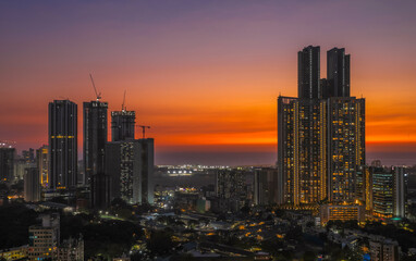 Stunning sunset silhouette of Mahalaxmi and Lower Parel, Mumbai