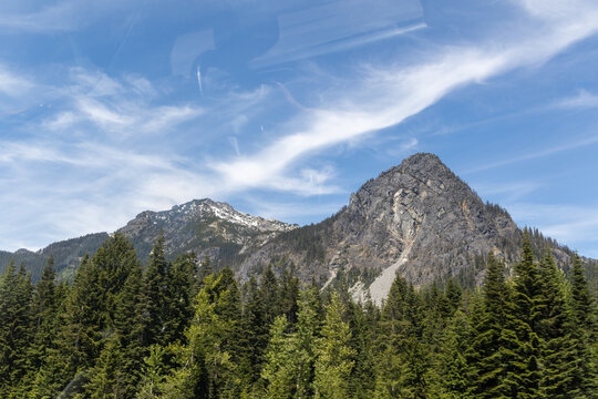 Washington mountain peaks under a blue sky