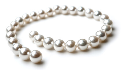 Fototapeta premium Elegant pearl necklace isolated on white, top view