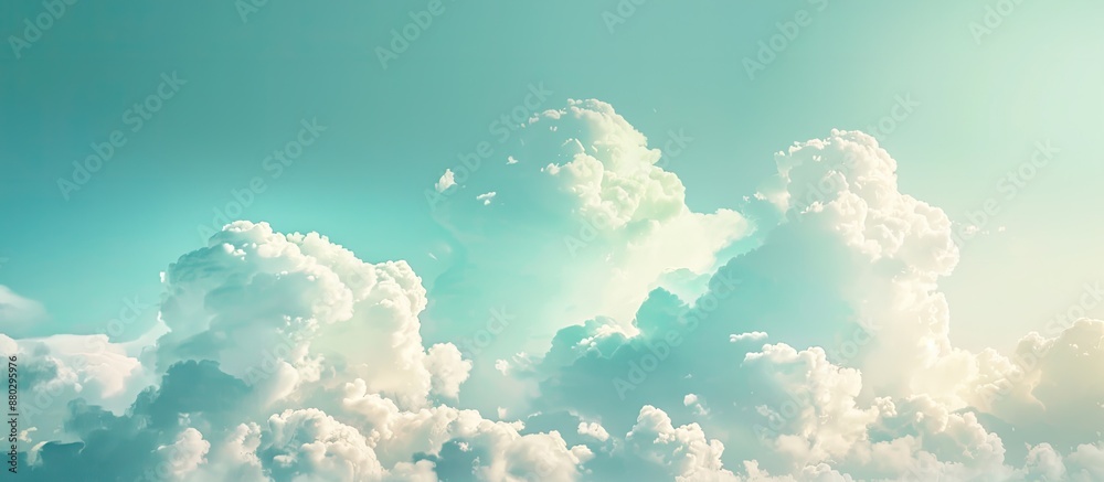 Poster soft-focus white clouds against a blue sky with a blank area for adding images, known as copy space 