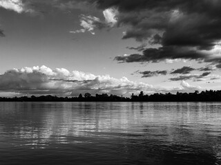 Fototapeta premium clouds over the river
