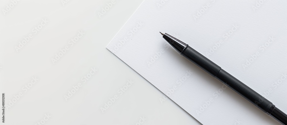 Fototapete top view shot of handwriting with a pen on a blank white surface, with ample copy space image availa
