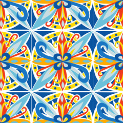 Vector geometric pattern in Sicilian majolica style with geometric patterns of plants and flowers in blue yellow orange shades