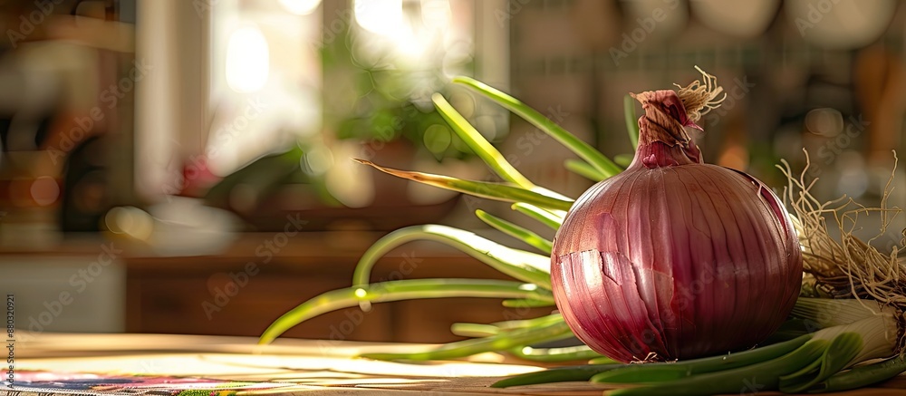 Poster a ripe red onion with vibrant green foliage rests on the kitchen table in a fresh spring setting, id