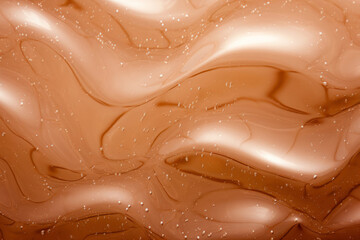 Fototapeta premium Processed collage of brown liquid silicon or plastic surface texture. Background for banner