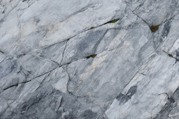 Fototapeta premium Processed collage of mountain cliff rock stone surface texture. Background for banner, backdrop