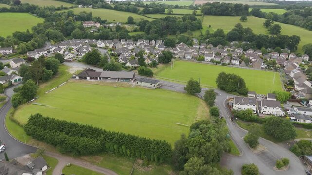 Aerial view of Okehampton RFC pitch in Okehampton Devon UK, showing rugby field and surrounding area