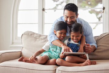 Father, girl and children with tablet on sofa with click on app, laugh and happy for show in family home. Man, dad and daughter kids with streaming, subscription and relax with movies in Indonesia