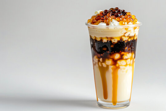 a milkshake with a chocolate sauce and whipped cream