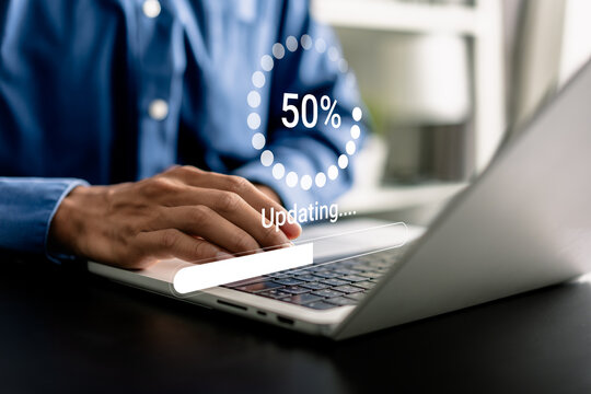 Programmer installing and updating firmware. Software updates or operating system upgrades release versions to enhance functionality in new versions and improve security.