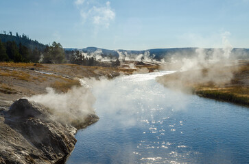 Firehole River, Yellowstone National Park, Wyoming, USA. The Firehole River flows through several significant geyser basins in the park