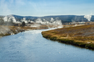 Firehole River, Yellowstone National Park, Wyoming, USA. The Firehole River flows through several significant geyser basins in the park