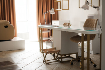 luxurious light manicure table in a beauty salon