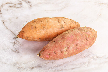 Raw ripe sweet potato heap