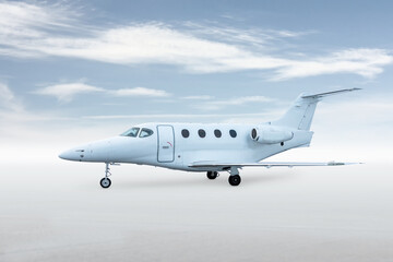 Obraz premium Modern white corporate aircraft isolated on bright background with sky