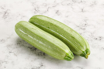 Raw green ripe zucchini vegetable