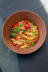 Table scene of assorted take out or delivery foods. Hamburgers, pizza, fried chicken and sides. Top down view on a dark wood banner background.