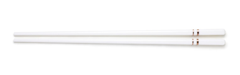 top view of white ceramic chopsticks on white background