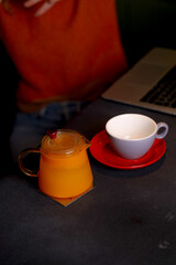 Table scene of assorted take out or delivery foods. Hamburgers, pizza, fried chicken and sides. Top down view on a dark wood banner background.