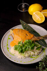 Table scene of assorted take out or delivery foods. Hamburgers, pizza, fried chicken and sides. Top down view on a dark wood banner background.