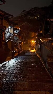 Wet Stone Steps in Traditional Japanese Alley on a Rainy Night
