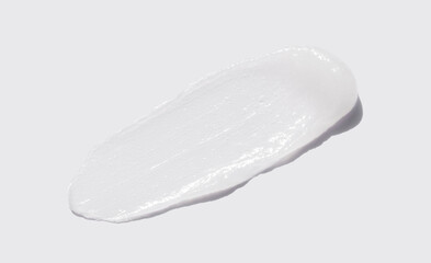 sample smear of cosmetic peeling gel on a light gray background close-up