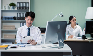 Asian business people working as a good team in the office. Successful teamwork in a meeting, workplace concept.