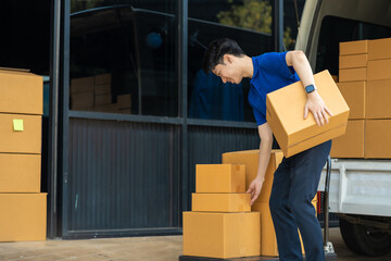 Asian delivery man work in truck for checking the product in the truck, concept ecommerce.