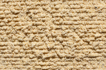 Abstract beige ground ginger background. Creativity in cooking.