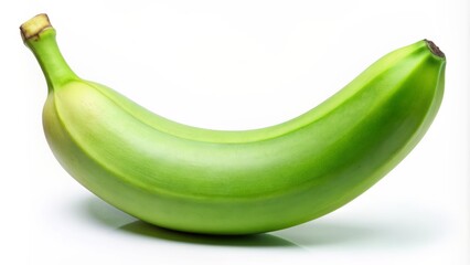 Fresh green banana isolated on a clean white background with slight yellow tint and gentle shadows accentuating its shape.