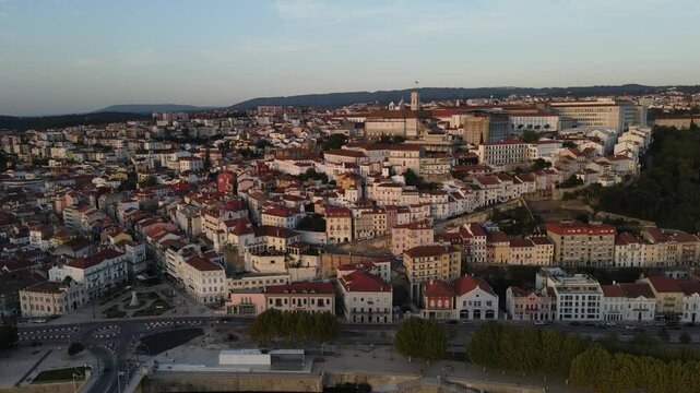 Aerial video of the Mondego River in front of downtown Coimbra, Europe, Portugal
