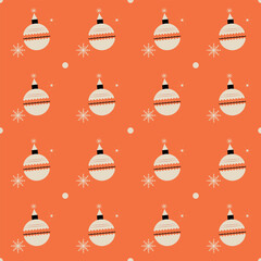 A pattern of orange and white Christmas ornaments