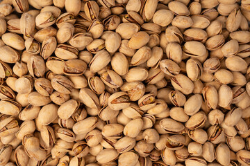 Tasty pistachios isolated on a white background.