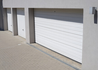 Automatic garage door in an apartment building, entrance to the underground parking of the house