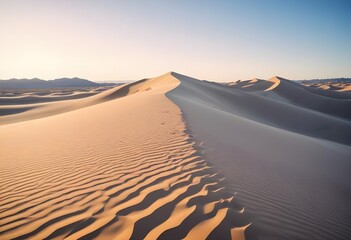 Sun sets over the desert landscape, dry sand dunes create a stunning natural scene perfect for those who love to travel and explore the heat of the wilderness