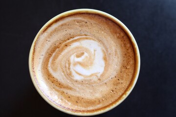Latte coffee on black background