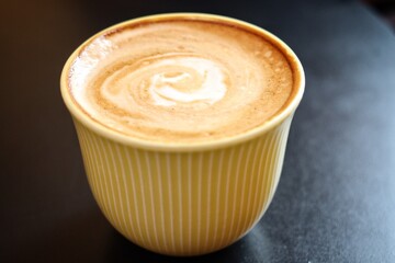 Latte coffee on black background